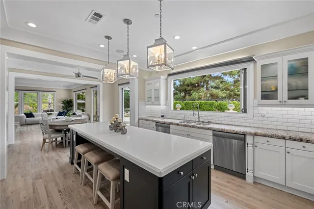 a bathroom with a bathtub and a window
