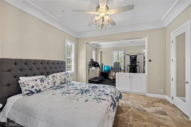 a view of roof deck with couches and wooden floor