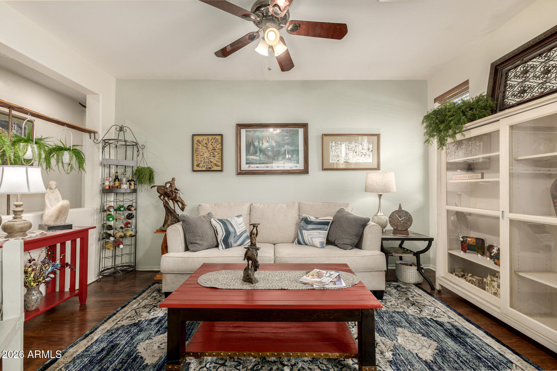 1849 South Balboa Drive Gilbert, AZ 85295 - Photo 15 of 35 a living room with furniture a rug and a window