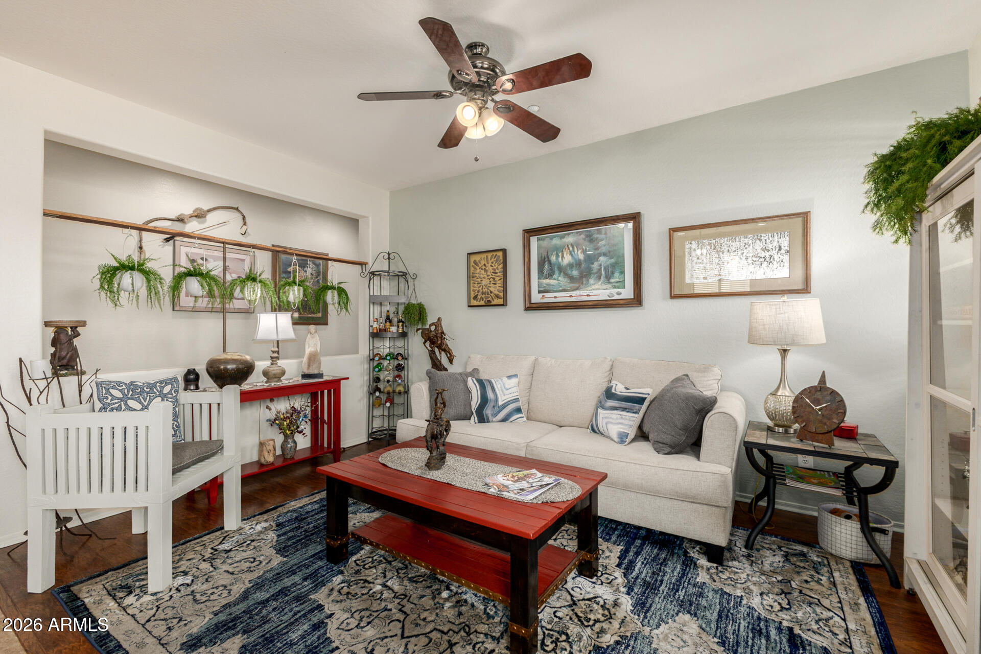 1849 South Balboa Drive Gilbert, AZ 85295 - Photo 16 of 35 a living room with furniture a rug and a window
