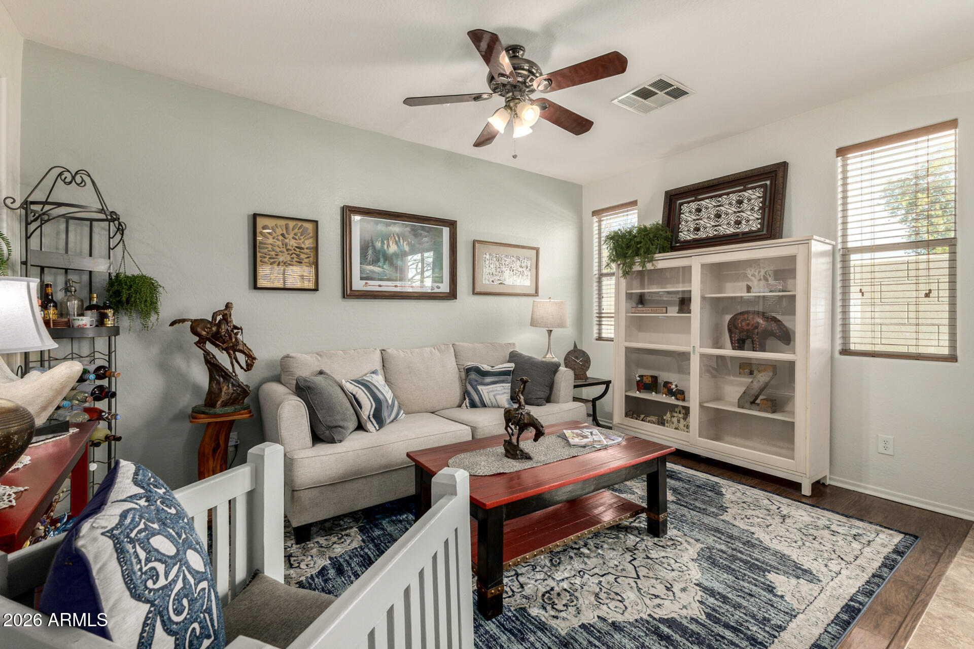 1849 South Balboa Drive Gilbert, AZ 85295 - Photo 17 of 35 a living room with furniture lamp and window
