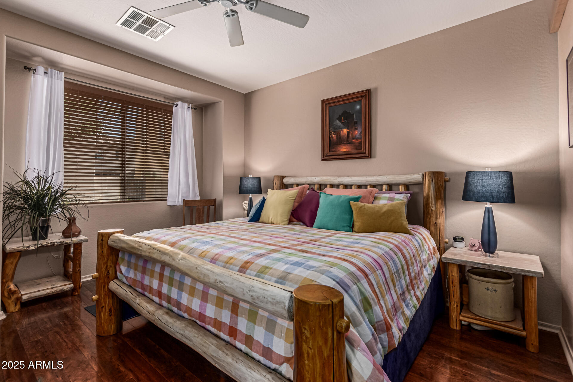 1849 South Balboa Drive Gilbert, AZ 85295 - Photo 21 of 35 a bedroom with a bed a table and chair