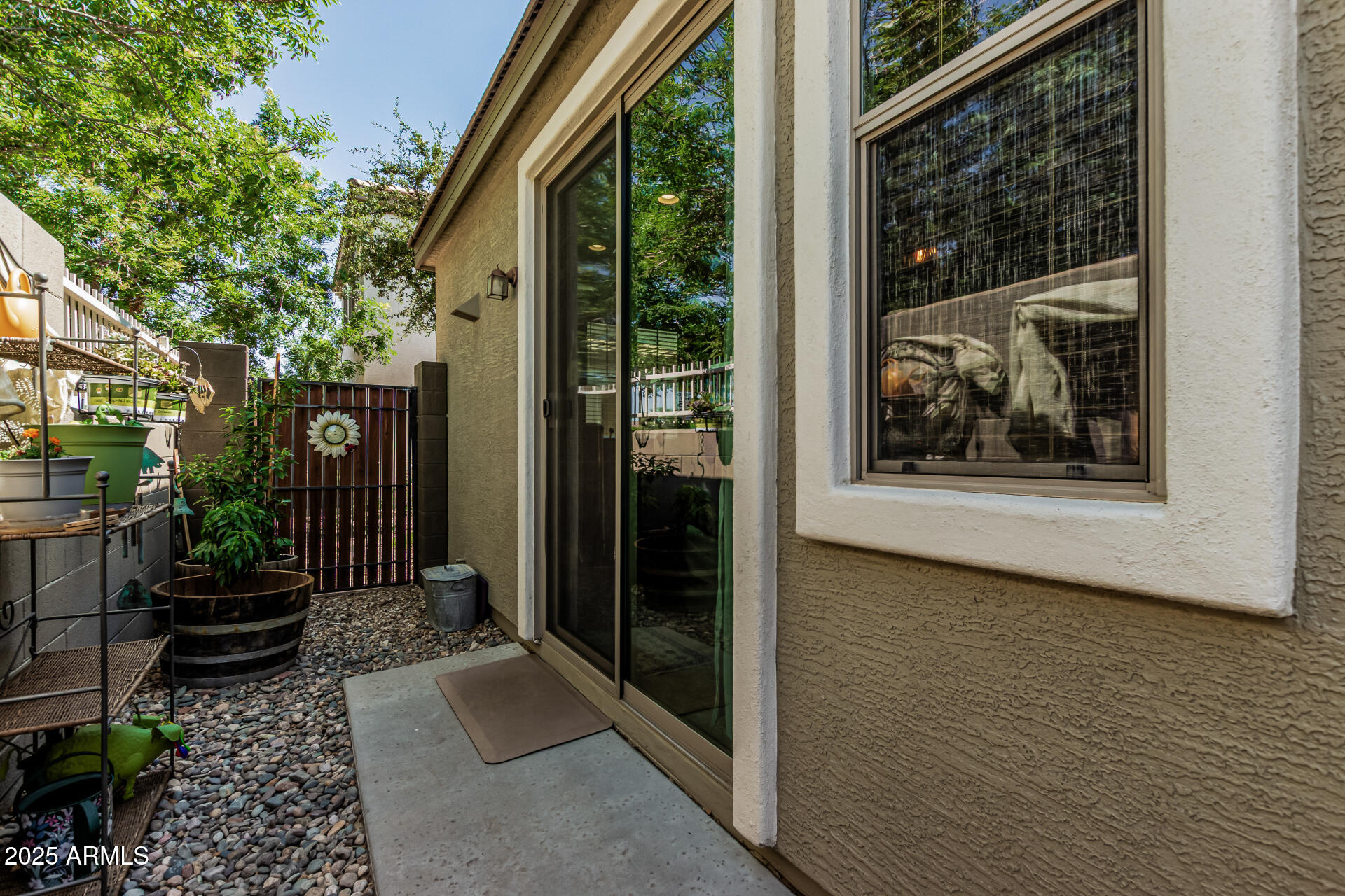 1849 South Balboa Drive Gilbert, AZ 85295 - Photo 33 of 35 a view of a door and chair in the house