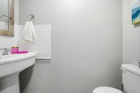 a bathroom with a sink and a toilet