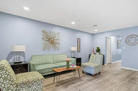 a living room with furniture and a couch