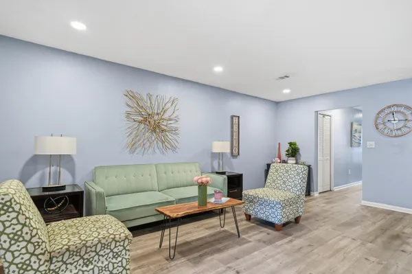 a living room with furniture and a couch