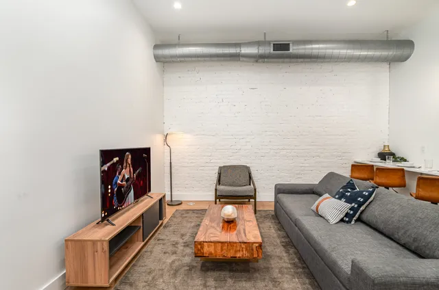 a living room with furniture and a couch