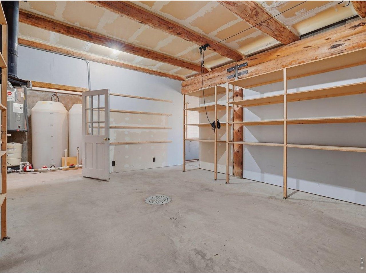1652 Eiger Road Livermore, CO 80536 - Photo 38 of 50 Expansive Garage Space, Storage, Holding tanks for 600 ft well and more.