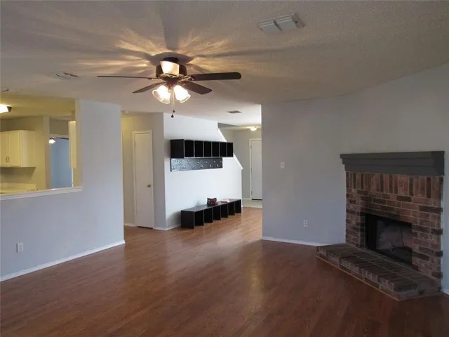 a backyard of a house with outdoor seating