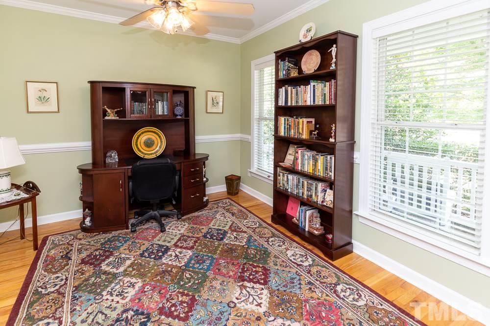 5116 Bartons Enclave Lane Raleigh, NC 27613 - Photo 3 of 30 a view of a workspace with furniture and a window