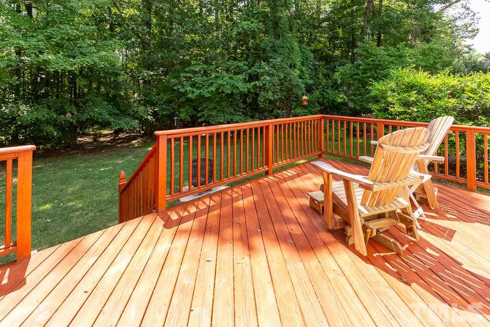 5116 Bartons Enclave Lane Raleigh, NC 27613 - Photo 27 of 30 a view of deck with a large garden