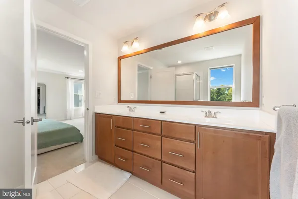 a bathroom with a shower toilet and sink