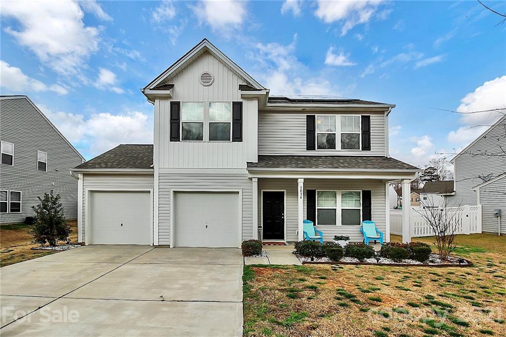 3034 Riker Street Clover, SC 29710 - Photo 1 of 42 a front view of a house with a yard