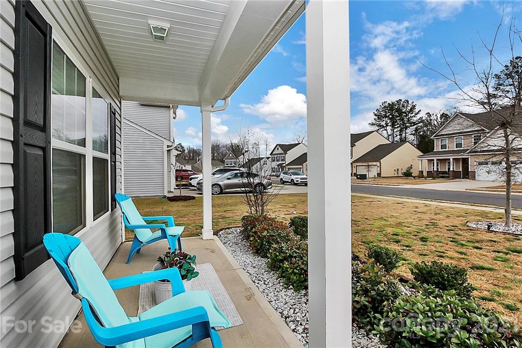 3034 Riker Street Clover, SC 29710 - Photo 2 of 42 a view of swimming pool with outdoor seating