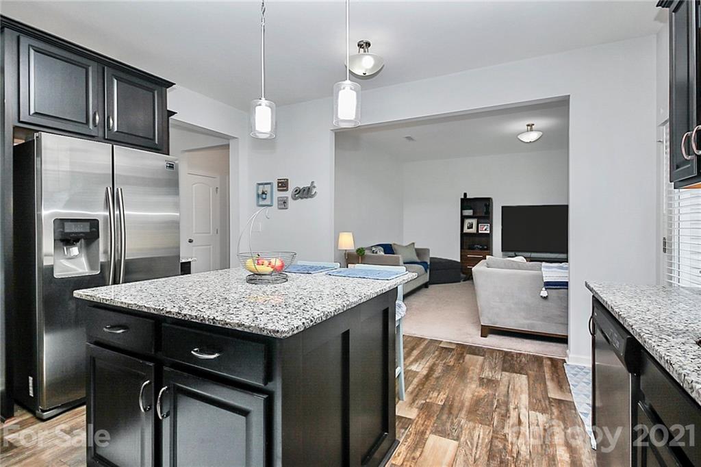 3034 Riker Street Clover, SC 29710 - Photo 15 of 42 a living room with stainless steel appliances granite countertop furniture sink refrigerator and microwave