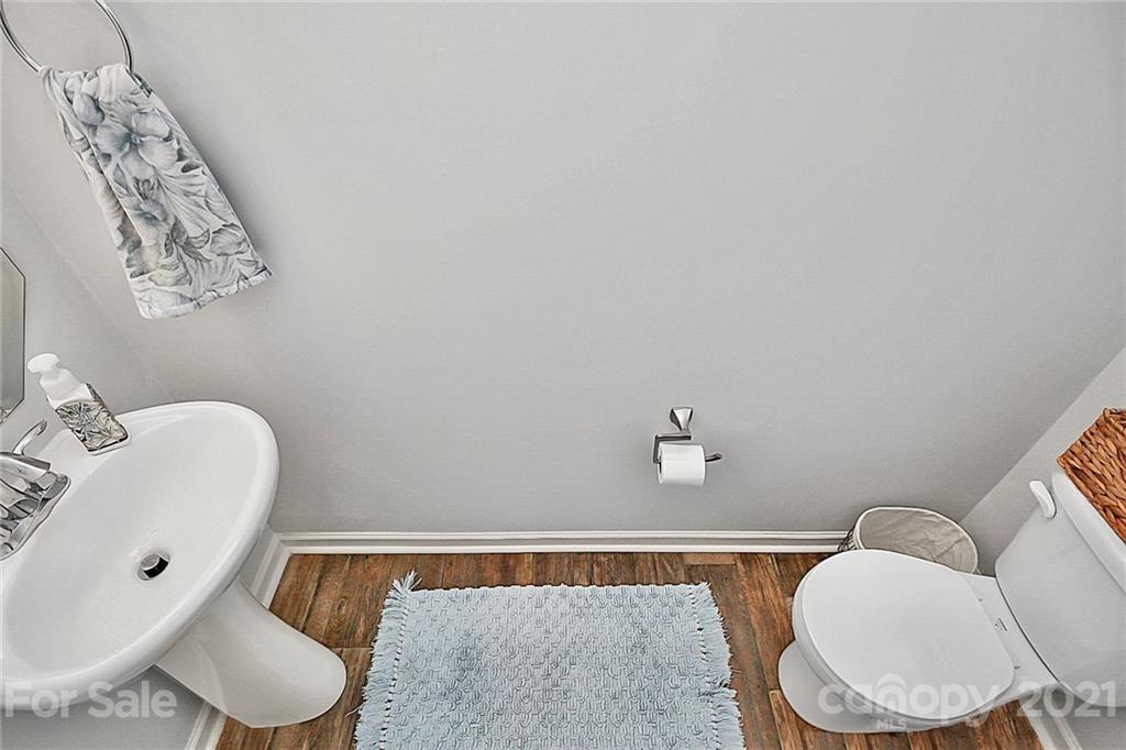 3034 Riker Street Clover, SC 29710 - Photo 20 of 42 a bathroom with a toilet sink and tub