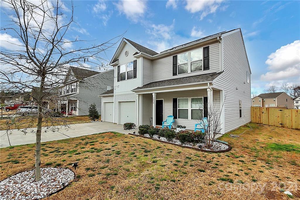 3034 Riker Street Clover, SC 29710 - Photo 3 of 42 a front view of a house with garden