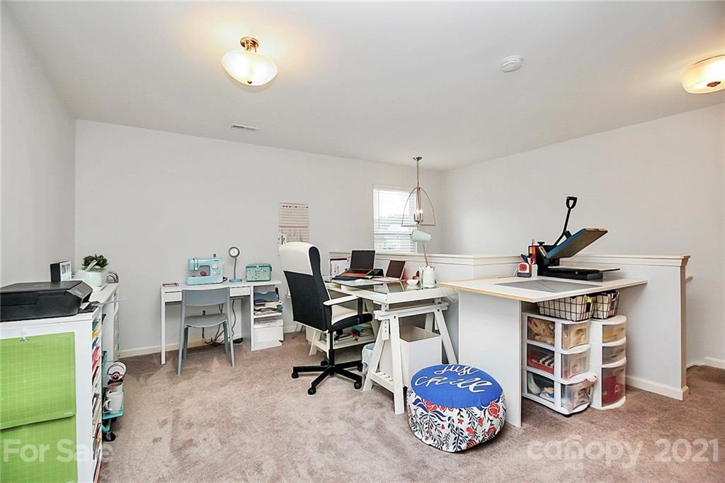 3034 Riker Street Clover, SC 29710 - Photo 22 of 42 a workspace with furniture and a window