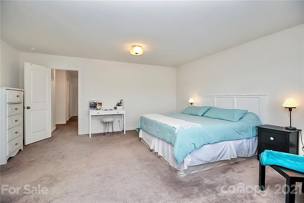 3034 Riker Street Clover, SC 29710 - Photo 24 of 42 a bedroom with a bed and a table