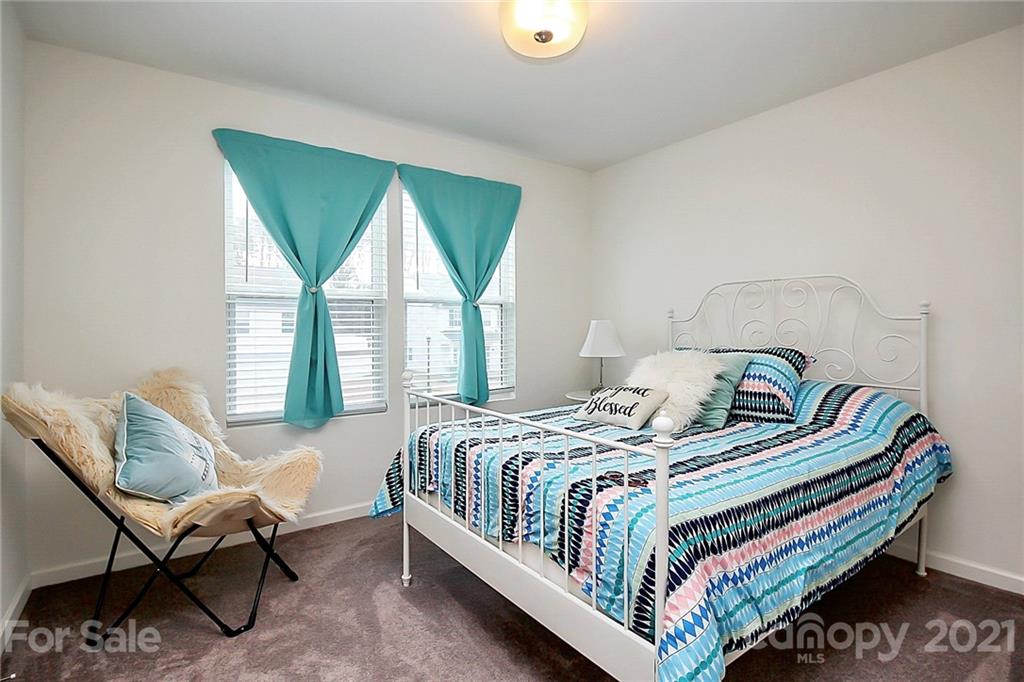 3034 Riker Street Clover, SC 29710 - Photo 34 of 42 a bedroom with a bed and a window
