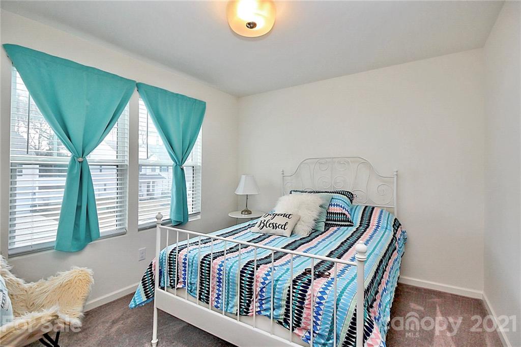3034 Riker Street Clover, SC 29710 - Photo 35 of 42 a bedroom with a bed and a window