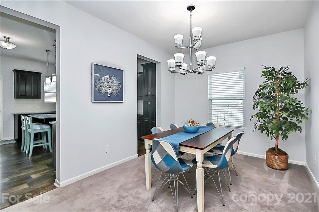 3034 Riker Street Clover, SC 29710 - Photo 7 of 42 a dining room with furniture and window