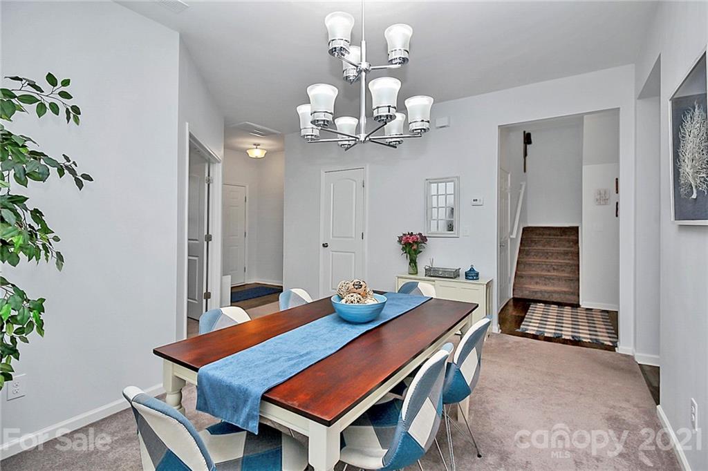 3034 Riker Street Clover, SC 29710 - Photo 10 of 42 a view of a dining room with a table and chairs