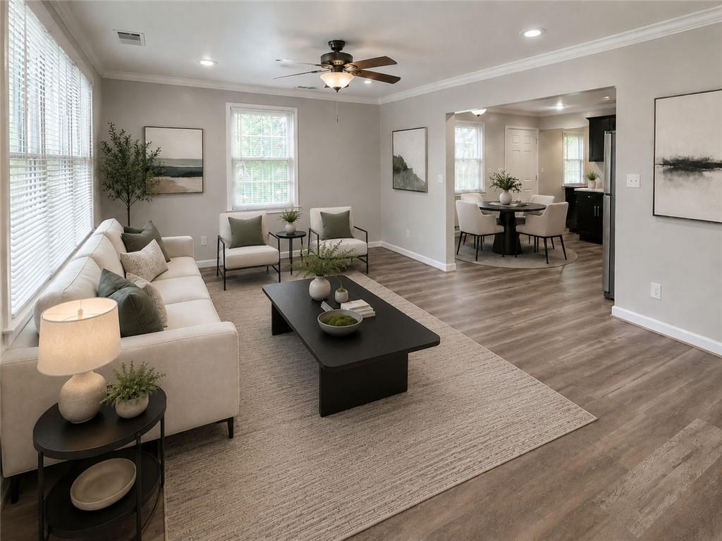 1280 Elizabeth Avenue Southwest Atlanta, GA 30310 - Photo 2 of 11 a living room with furniture and wooden floor