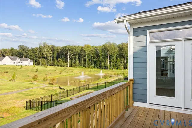 a view of swimming pool with an outdoor seating