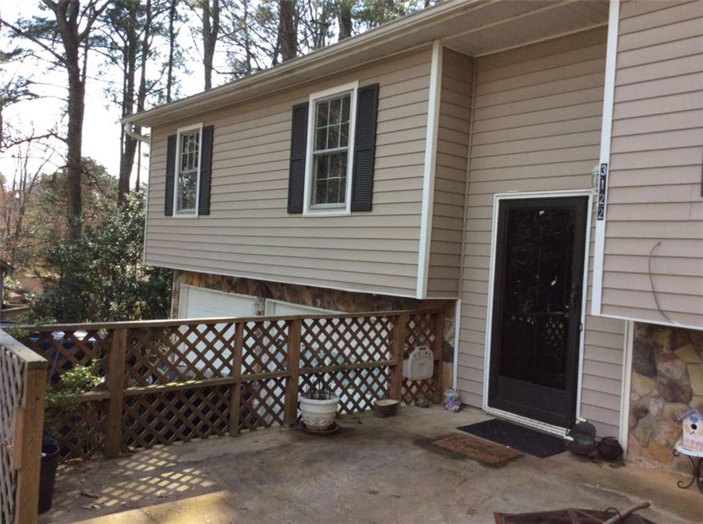 3122 Dempsey Place Lawrenceville, GA 30044 - Photo 1 of 2 a side view of a house