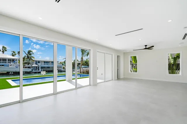 a bathroom with a sink toilet and mirror