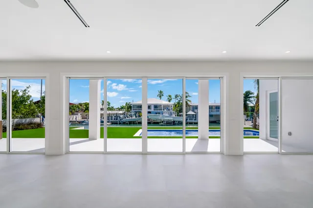 a vase of flowers sitting on a shelf