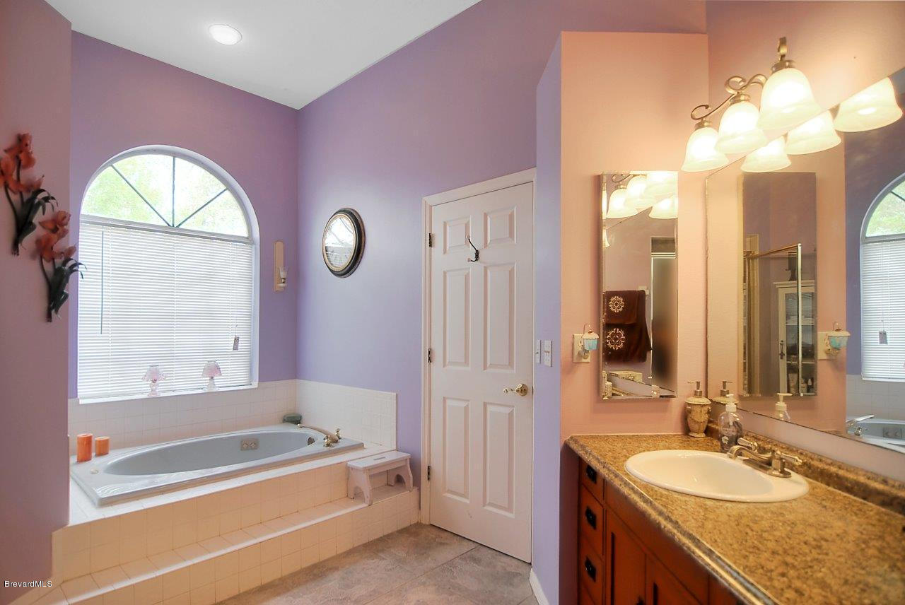 3345 Holly Springs Road Melbourne, FL 32934 - Photo 12 of 12 masterbath (3)