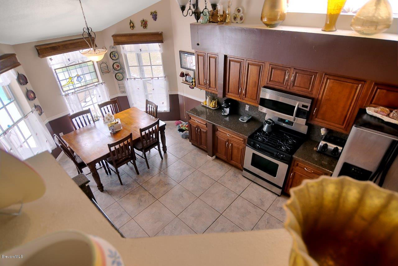3345 Holly Springs Road Melbourne, FL 32934 - Photo 7 of 12 kitchen above