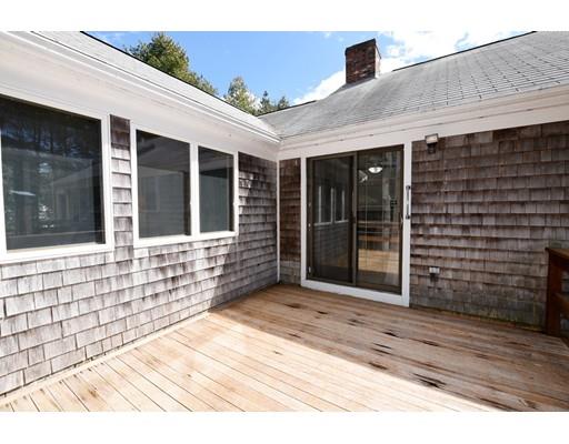 125 Sandy Valley Road Barnstable, MA 02648 - Photo 23 of 25 a view of a brick house with a large window