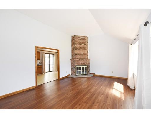 125 Sandy Valley Road Barnstable, MA 02648 - Photo 3 of 25 a view of an empty room with wooden floor and a window