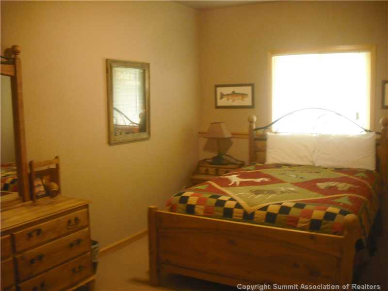 9062 Ryan Gulch Road, Unit B Silverthorne, CO 80498 - Photo 12 of 14 Bedroom. Lower level bedroom #3