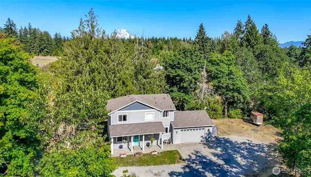 a front view of a house with a porch