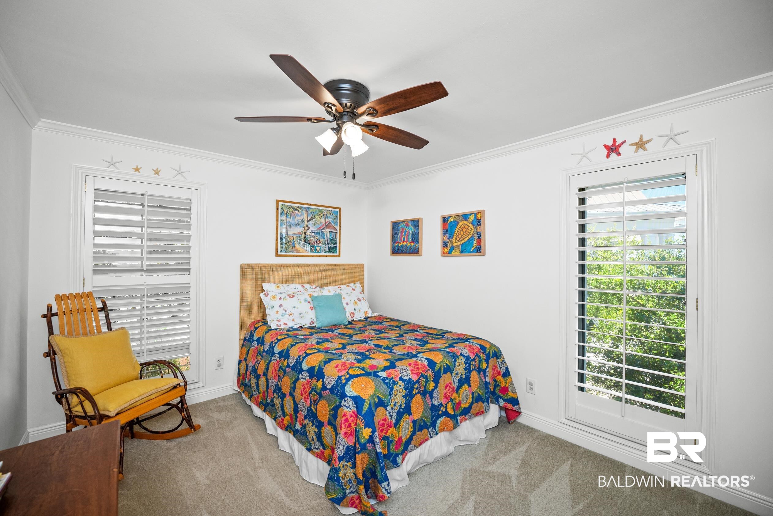 31304 River Road Orange Beach, AL 36561 - Photo 37 of 78 Carpeted bedroom featuring crown molding, baseboards, and a ceiling fan