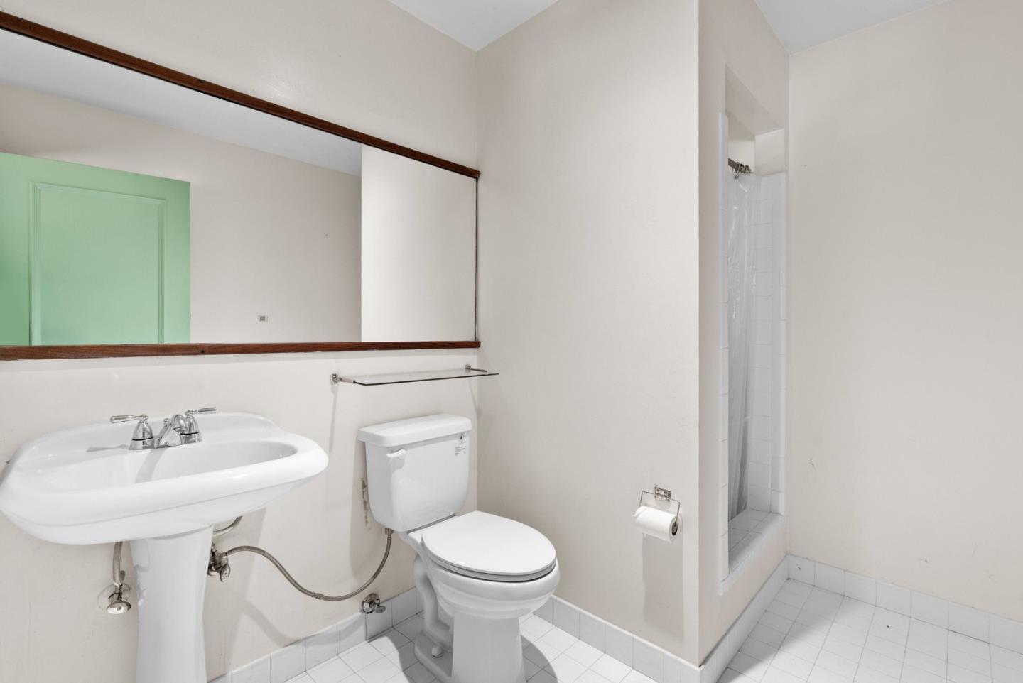 4611 Bonny Doon Road Santa Cruz, CA 95060 - Photo 31 of 94 a bathroom with a sink toilet and a mirror