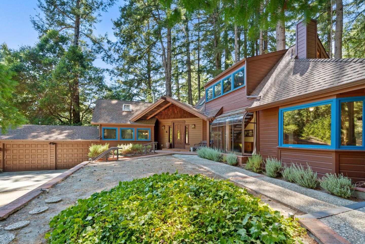 4611 Bonny Doon Road Santa Cruz, CA 95060 - Photo 45 of 94 a front view of a house with a yard