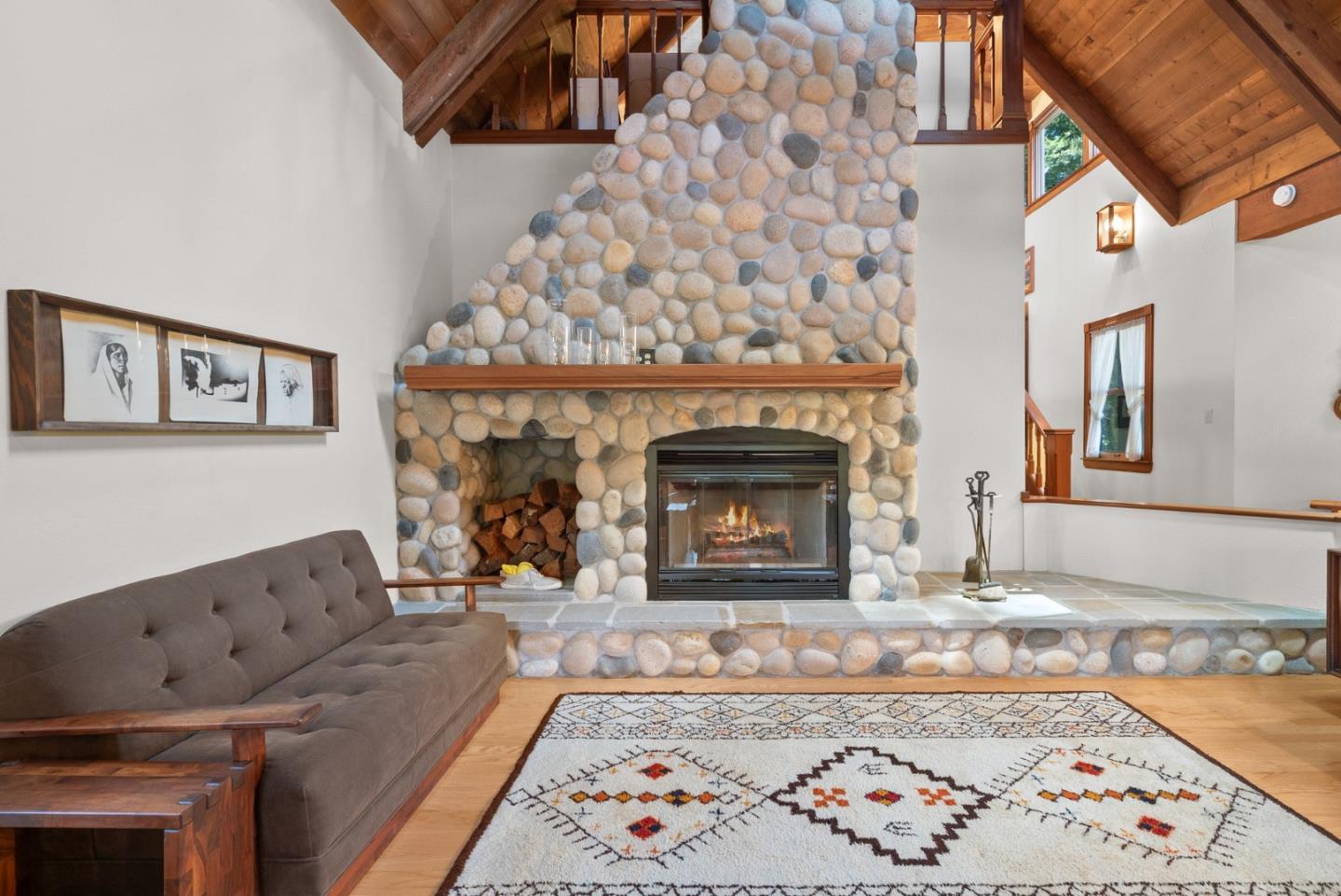 4611 Bonny Doon Road Santa Cruz, CA 95060 - Photo 5 of 94 a living room with furniture and a fireplace