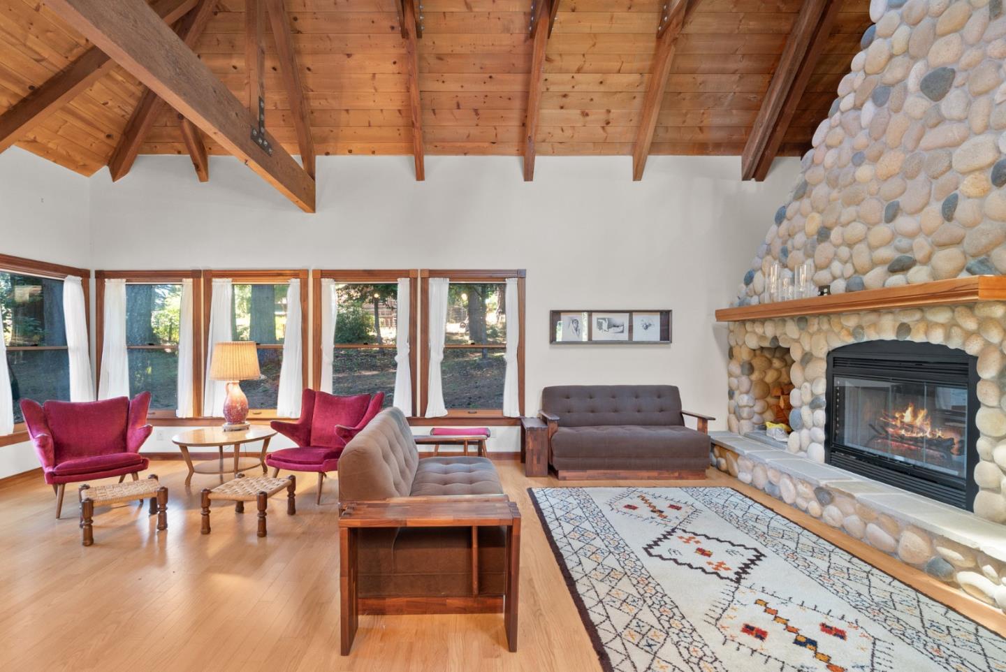 4611 Bonny Doon Road Santa Cruz, CA 95060 - Photo 54 of 94 a living room with furniture and a fireplace