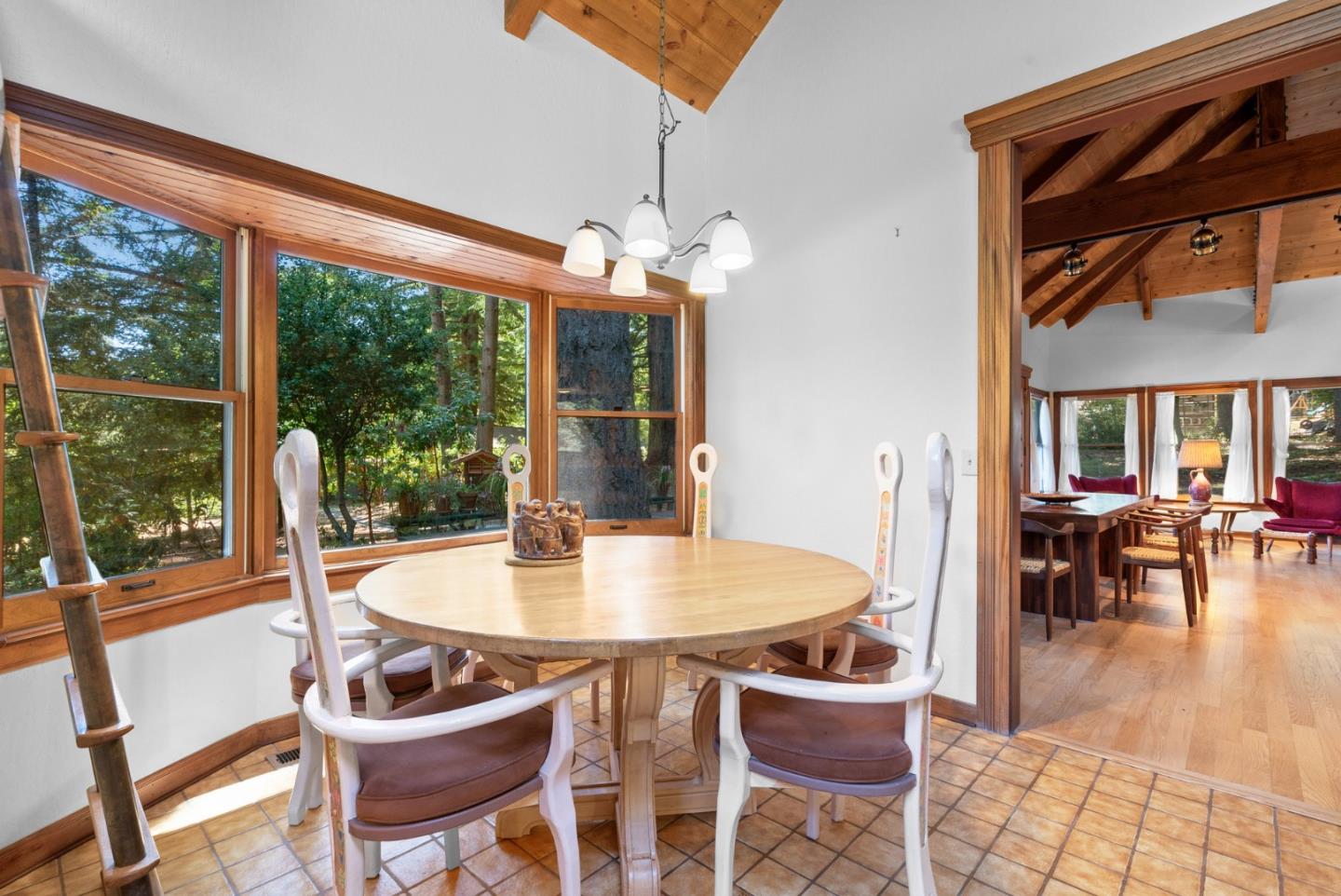 4611 Bonny Doon Road Santa Cruz, CA 95060 - Photo 58 of 94 a view of a dining room with furniture window and outside view