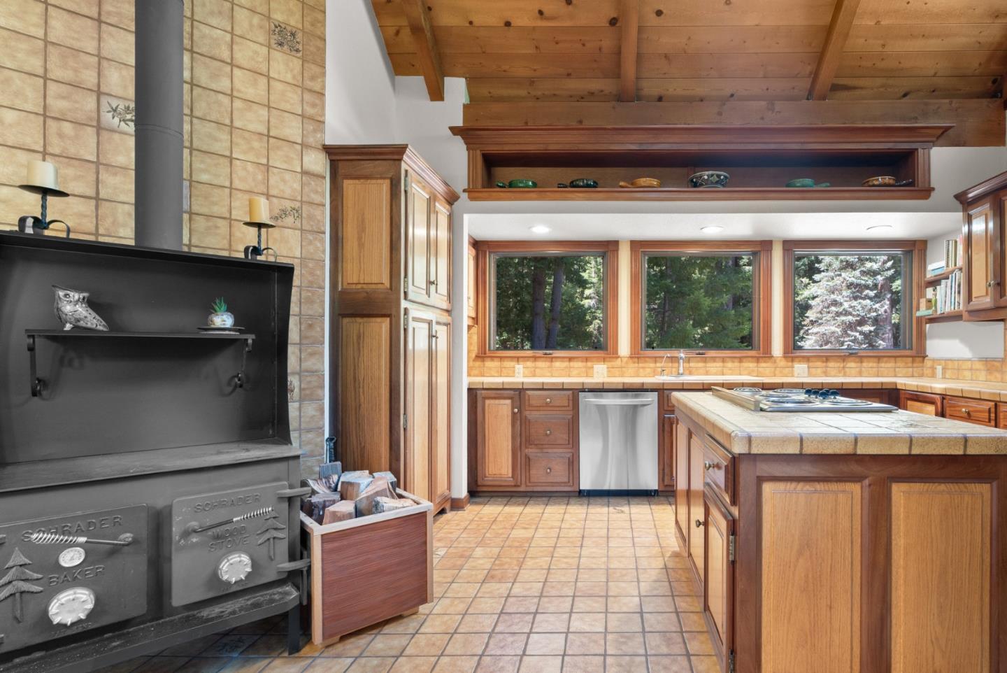 4611 Bonny Doon Road Santa Cruz, CA 95060 - Photo 59 of 94 a kitchen with a stove a sink and a refrigerator