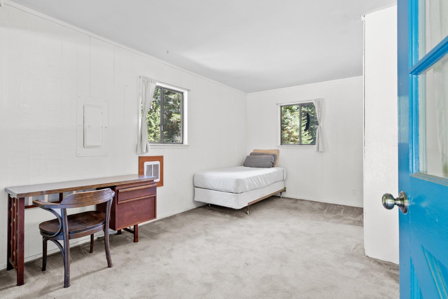 4611 Bonny Doon Road Santa Cruz, CA 95060 - Photo 77 of 94 a living room with furniture and a window