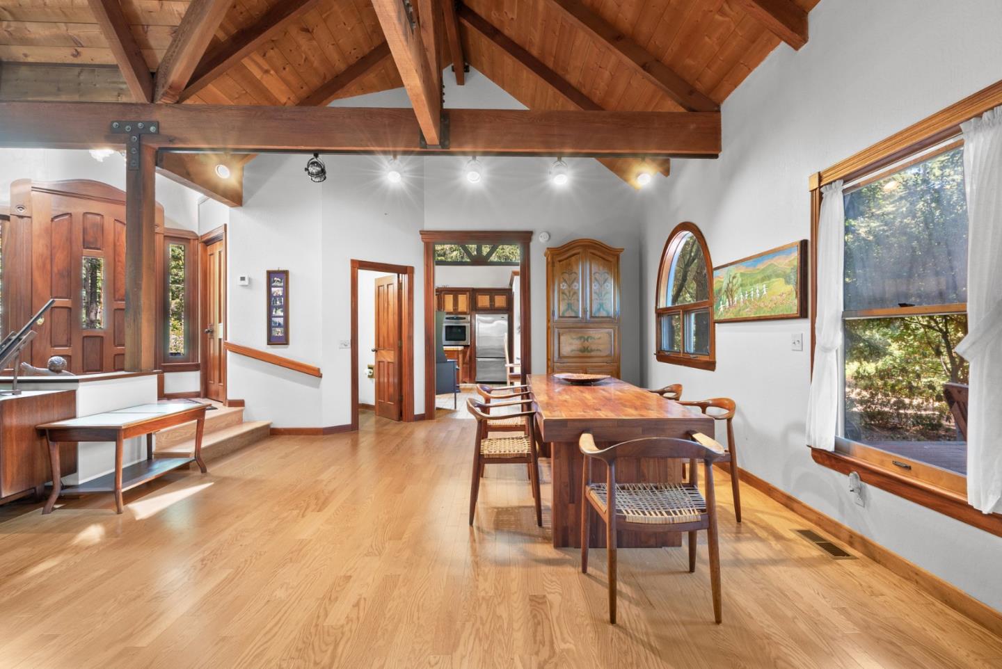 4611 Bonny Doon Road Santa Cruz, CA 95060 - Photo 8 of 94 a view of a dining room with furniture window and wooden floor