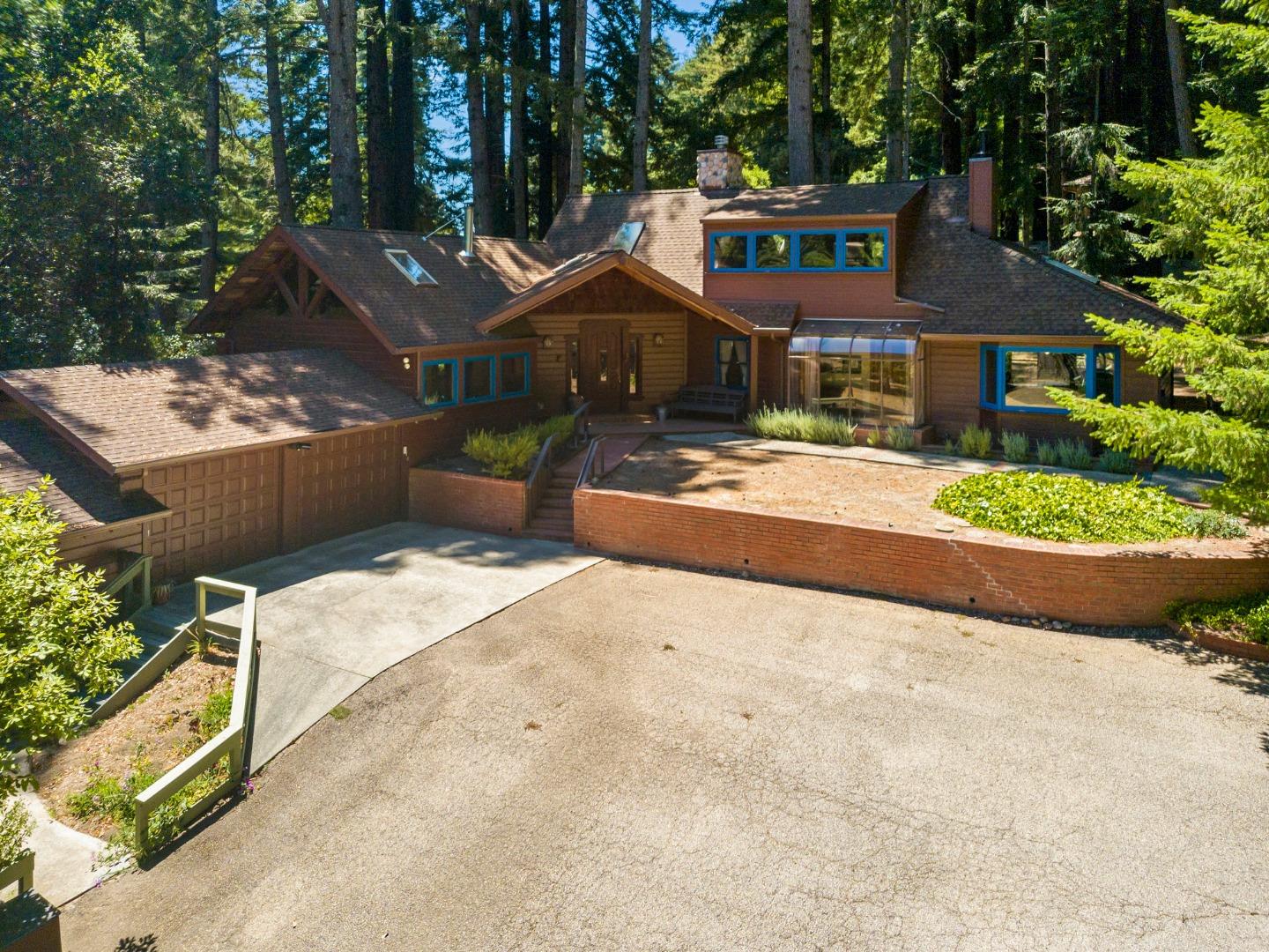 4611 Bonny Doon Road Santa Cruz, CA 95060 - Photo 92 of 94 a front view of a house with a yard