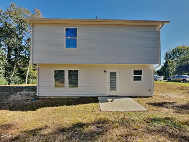 a front view of house with yard