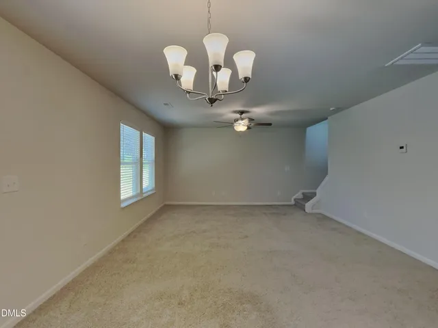 a view of livingroom with chandelier